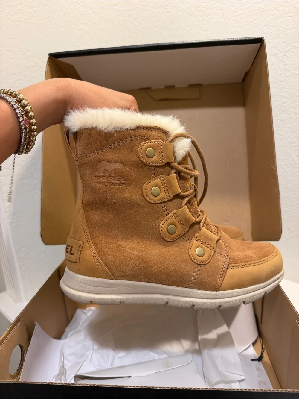 Sorel cozy faux